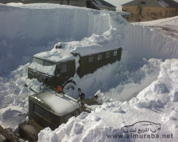 رجل روسي يطور سيارته للثلج ( بالصور ) 13