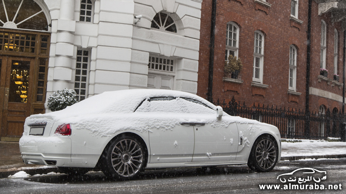 [صور] السيارات الفاخرة في لندن يغطيها الثلج في مشهد رائع وجميل "40 صورة" 100