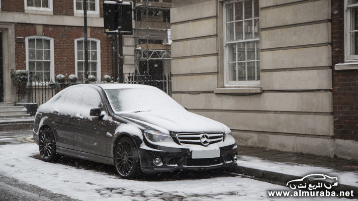 [صور] السيارات الفاخرة في لندن يغطيها الثلج في مشهد رائع وجميل "40 صورة" 102