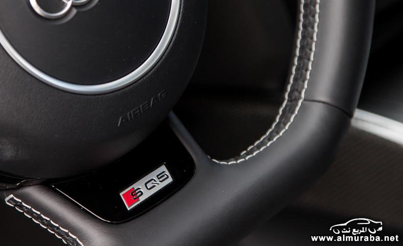 2014-audi-sq5-steering-wheel-badge-photo-559623-s-787x481