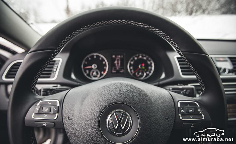2014-volkswagen-passat-sport-18t-steering-wheel-photo-562903-s-787x481