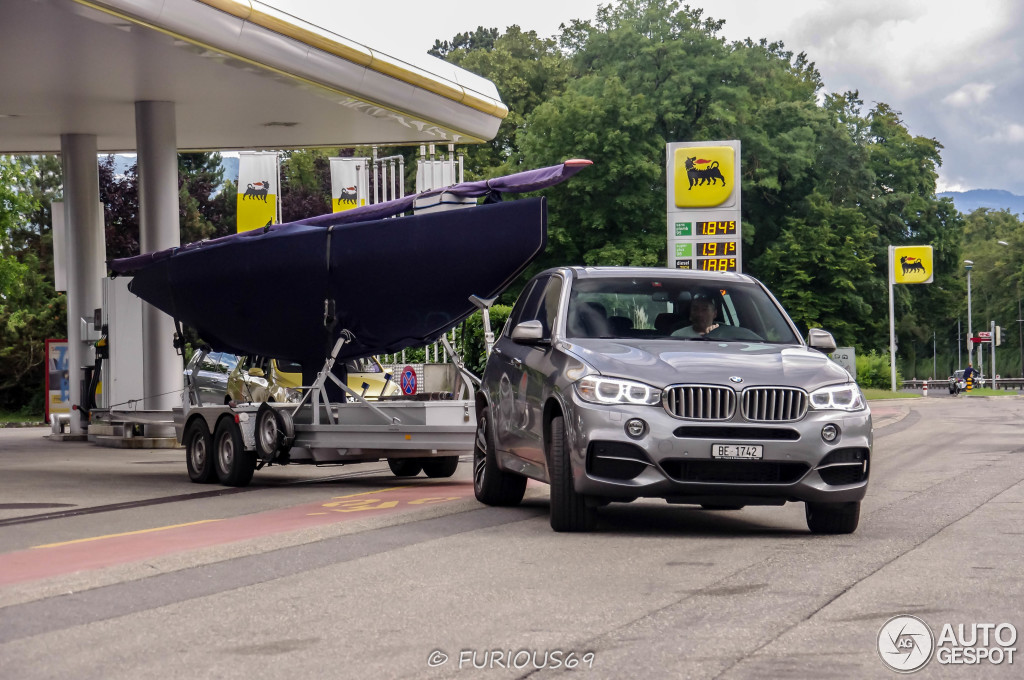bmw-x5-m50d-spotted-towing-a-sailboat-in-geneva-photo-gallery_1