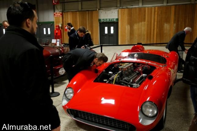 فيراري ”335 سبورت سكاليتي” تباع بـ 32 مليون يورو في مزاد أقيم بباريس Visitors look at a red 1957 Ferrari 335 Sport Scaglietti model on display at the Paris Retromobile fair in Paris, France, February 5, 2016. REUTERS/Philippe Wojazer