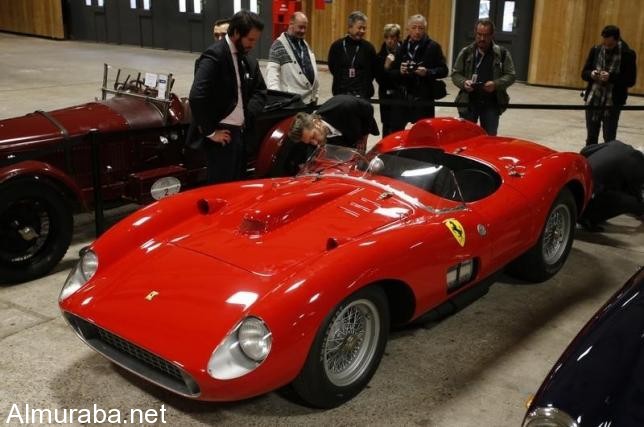 فيراري ”335 سبورت سكاليتي” تباع بـ 32 مليون يورو في مزاد أقيم بباريس Visitors look at a red 1957 Ferrari 335 Sport Scaglietti model on display at the Paris Retromobile fair in Paris, France, February 5, 2016. REUTERS/Philippe Wojazer