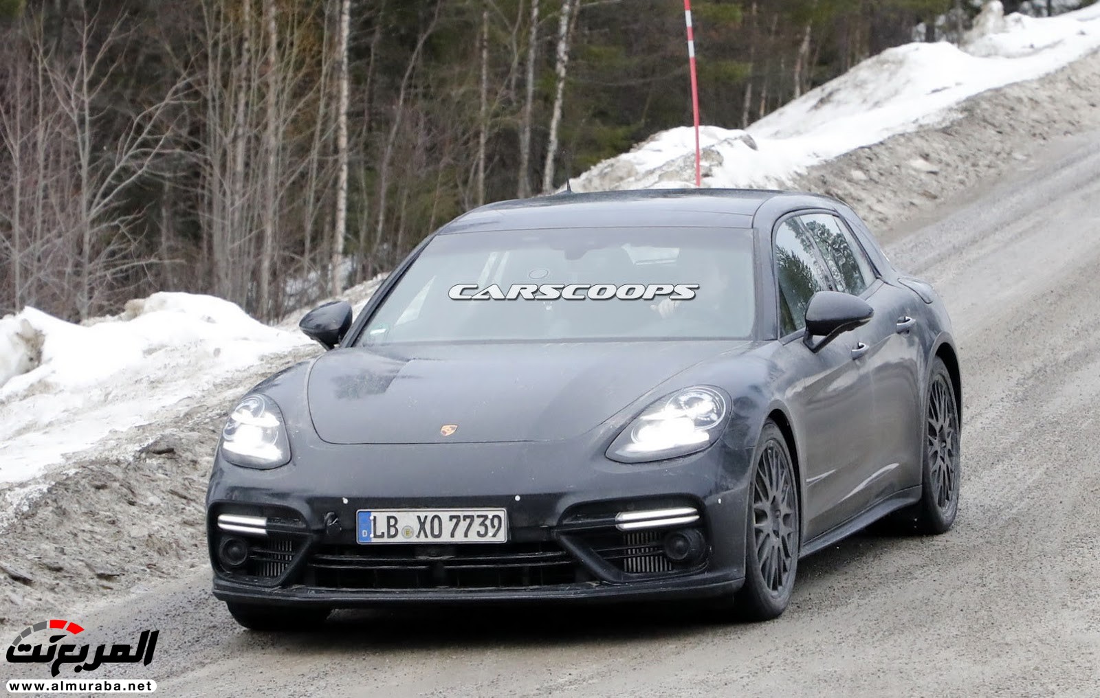 "صور تجسسية" أثناء اختبار "بورش" باناميرا سبورت توريزمو 2018 ذات المكونات الهجينة قُبيل تدشينها بجنيف Porsche 12