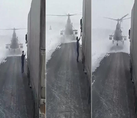 “فيديو” شاهد مقطع غريب لمروحية عسكرية لحظة هبوطها على الطريق