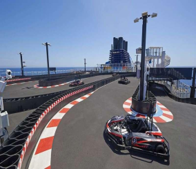 “بالصور” شاهد السفينة السياحية العملاقة “نوريجيان بليس” على متنها مضمار لسباق السيارات