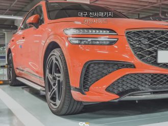 جينيسيس GV70 ماجما الرياضية تظهر للمرة الأولى بصور تجسسية بجناح خلفي نشط جينيسيس GV70 ماجما