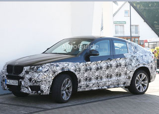 تسريب صور بي ام دبليو اكس فور 2015 الجديدة كلياً بجانب شقيقتها الأقدم اكس ثري BMW X4 2015 3