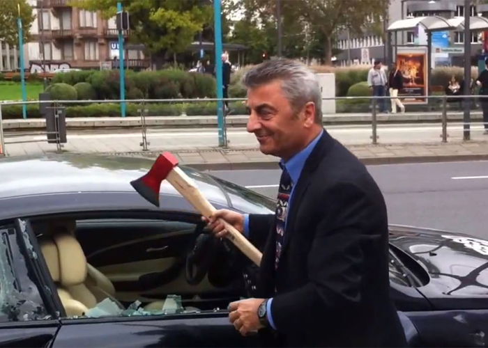 “فيديو وصور” ايطالي من اصول ايرانية يحطم سيارته الـBMW الفارهة أمام المارة بجنيف